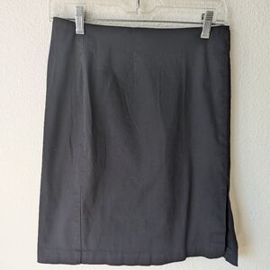Knee Length Vintage Retro Pencil Black Skirt. Says size 12 but looks like an 8.
